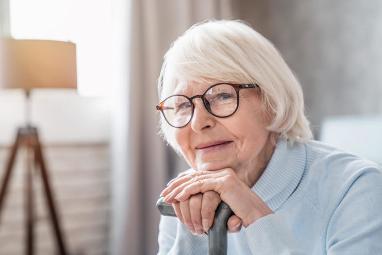 mature woman looking at care giver