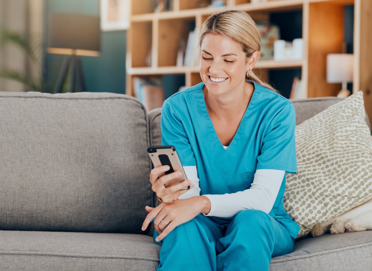 caregiver using mobile phone to submit feedback, concept of in-app satisfaction tracking