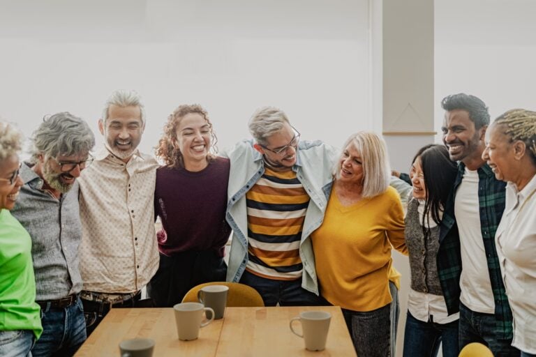 multiracial people with different ages and ethnicities having fun in a seminar