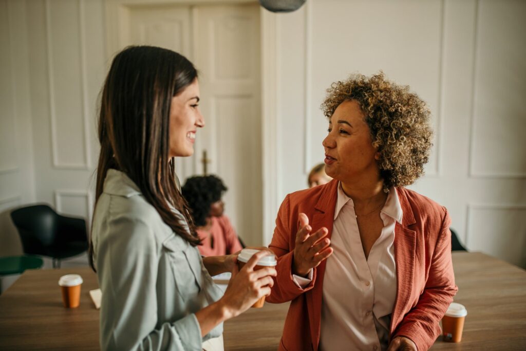 women talking and discussing with each other
