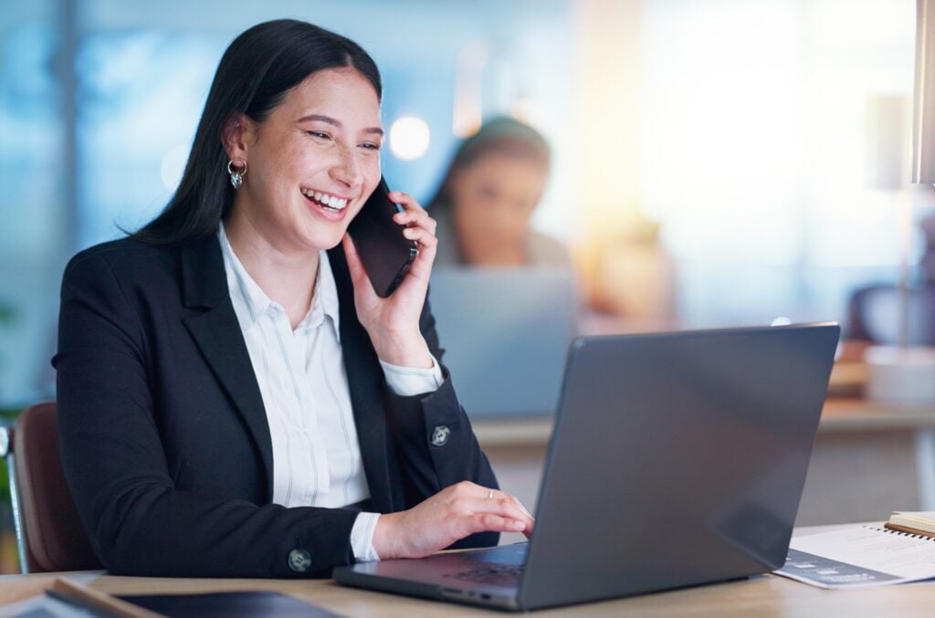 phone call and woman with a laptop, concept of client support