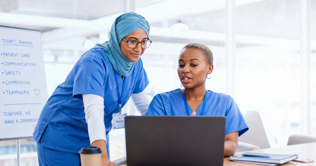 two caregivers speaking to each other, concept of teaching, training, team management