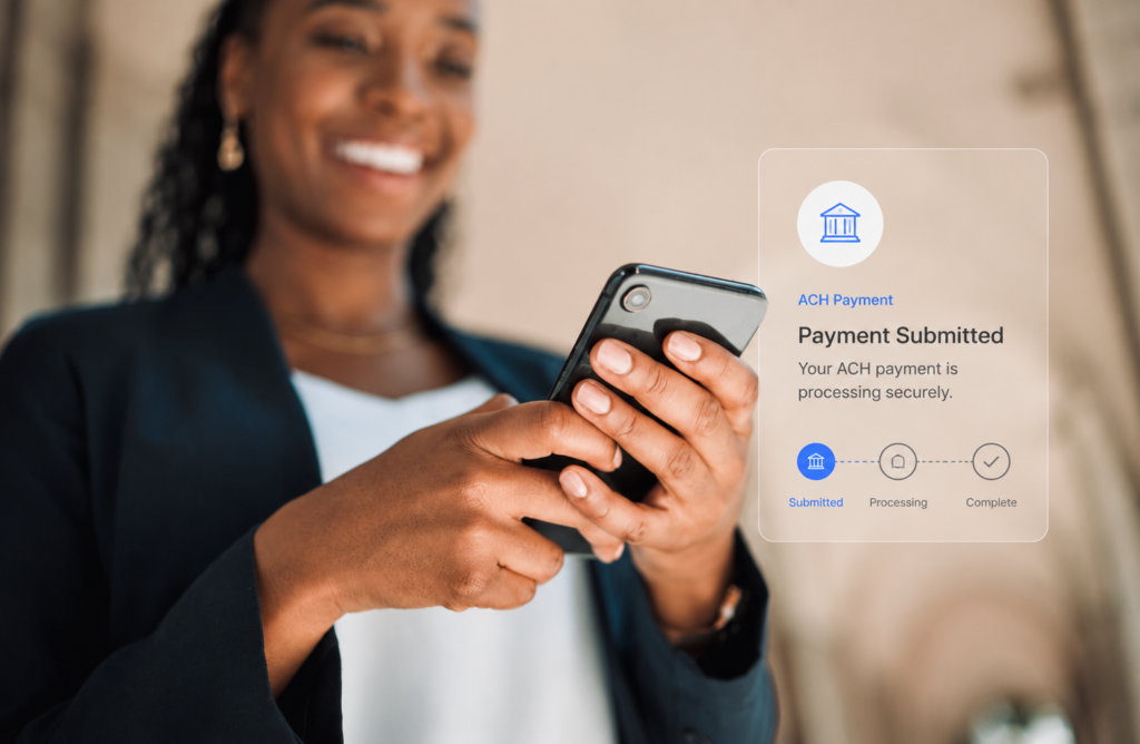 Smiling woman submitting ACH payment