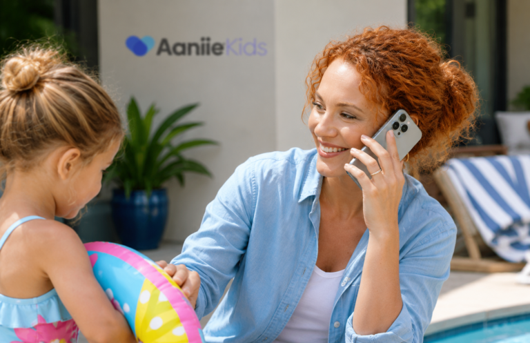a mother using a modern smartphone with a visible camera, actively engaged in a phone call