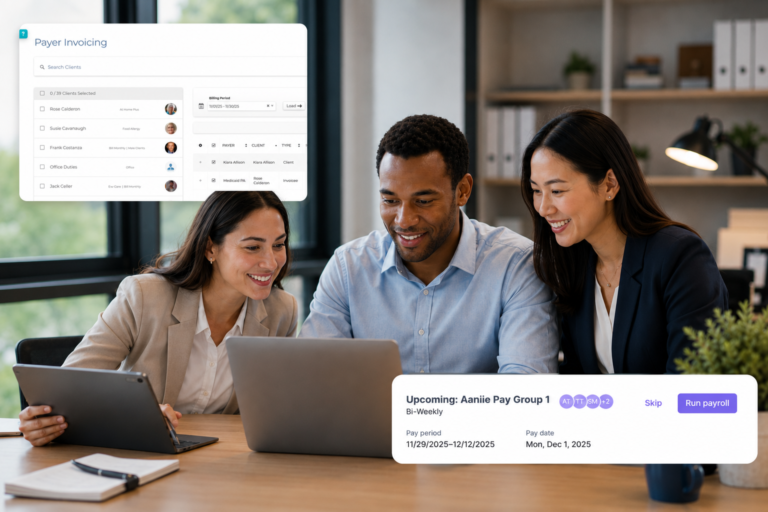 image of male and female employees looking at a laptop in an office setting, concept of Aaniie Payroll