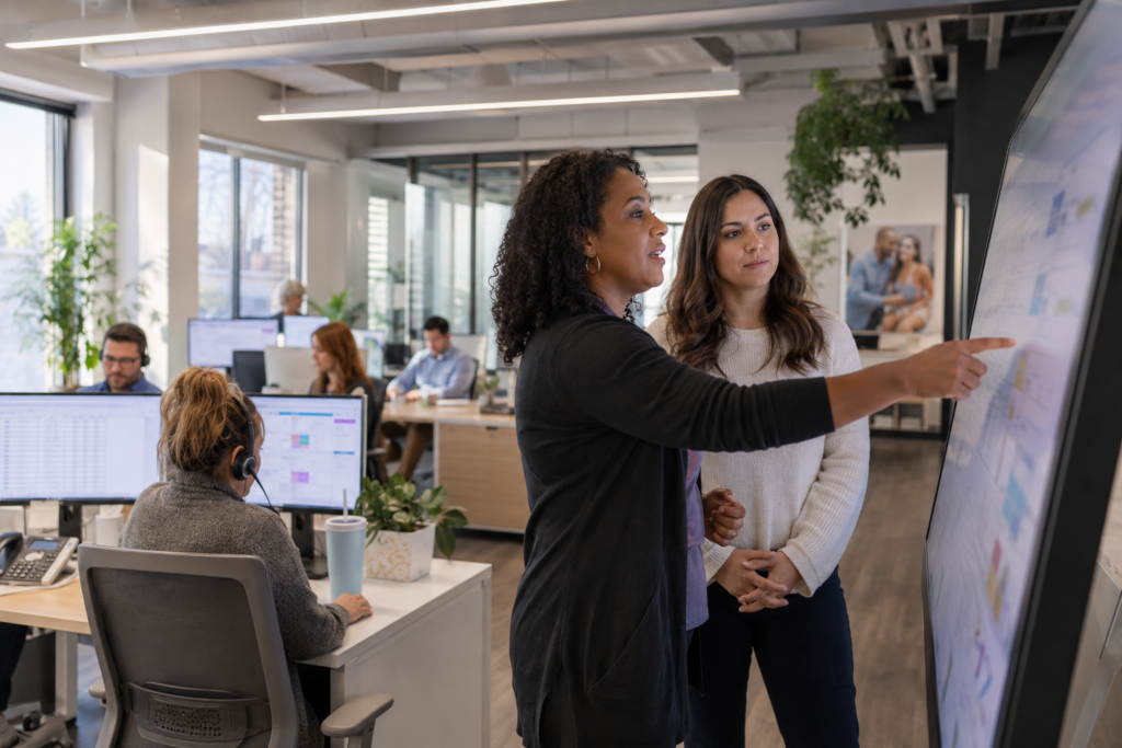home care staff discussing how a centralized system connects and simplifies managing referral inquiries and relationships