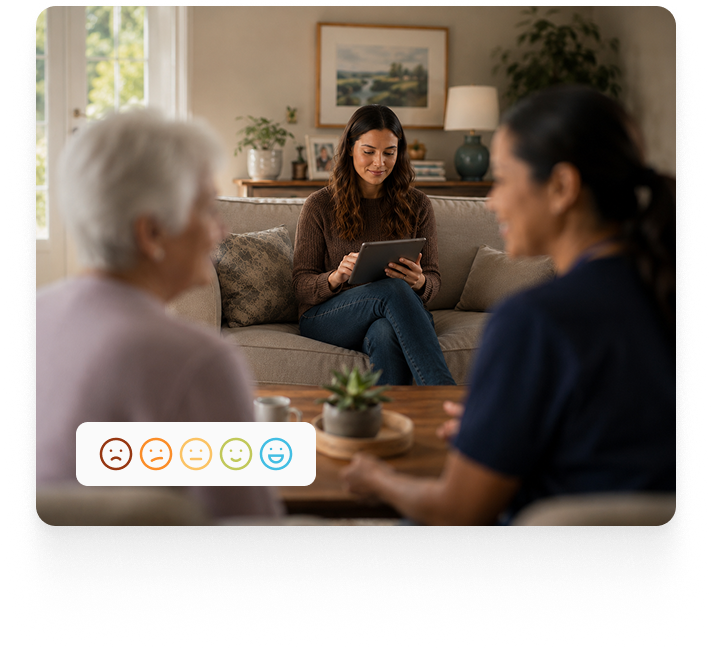 a family member reviewing a care plan with a caregiver, using a tablet device equipped with Aaniie home care software