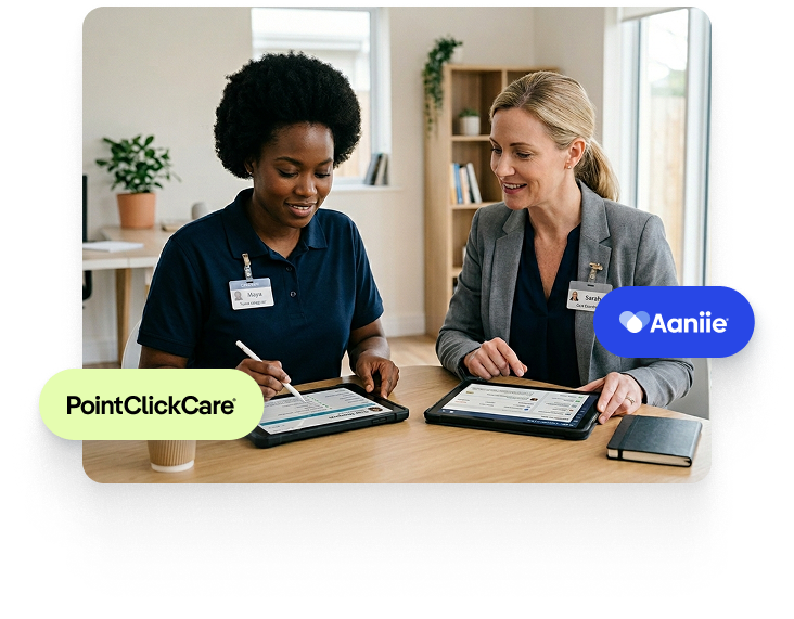 Senior living staff using connected tablets to coordinate care across integrated platforms