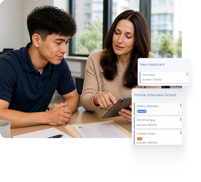 Home care manager and staff member reviewing caregiver applications and interview schedules on a tablet, illustrating recruitment, onboarding, and retention workflows
